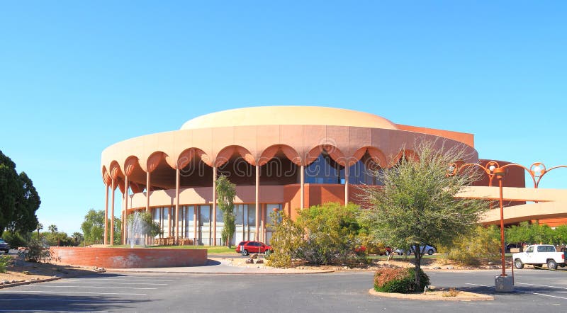 There are two more photos of this building in my portfolio. Grady Gammage Memorial Auditorium is considered to be the last public commission of architect Frank Lloyd Wright. Construction on the building began on May 23, 1962. It took 25 months to complete. The building opened in 1964. Its multiple shades of terracotta echo the colors of the desert. It is named for Dr. Grady Gammage, President of Arizona State University &#ASU&# from 1933 to 1959. The auditorium is located on the main campus of Arizona State University in Temp at the crossroads of Mill Avenue and Apache Boulevard. Twin flying buttress pedestrian ramps &#one visible here&# extending 200 feet &#61 m&# from the north and east sides of the structure connect the building to the parking lot. The building was placed on the National Register of Historic Places in 1985. &#from Wikipedia&#. There are two more photos of this building in my portfolio. Grady Gammage Memorial Auditorium is considered to be the last public commission of architect Frank Lloyd Wright. Construction on the building began on May 23, 1962. It took 25 months to complete. The building opened in 1964. Its multiple shades of terracotta echo the colors of the desert. It is named for Dr. Grady Gammage, President of Arizona State University &#ASU&# from 1933 to 1959. The auditorium is located on the main campus of Arizona State University in Temp at the crossroads of Mill Avenue and Apache Boulevard. Twin flying buttress pedestrian ramps &#one visible here&# extending 200 feet &#61 m&# from the north and east sides of the structure connect the building to the parking lot. The building was placed on the National Register of Historic Places in 1985. &#from Wikipedia&#