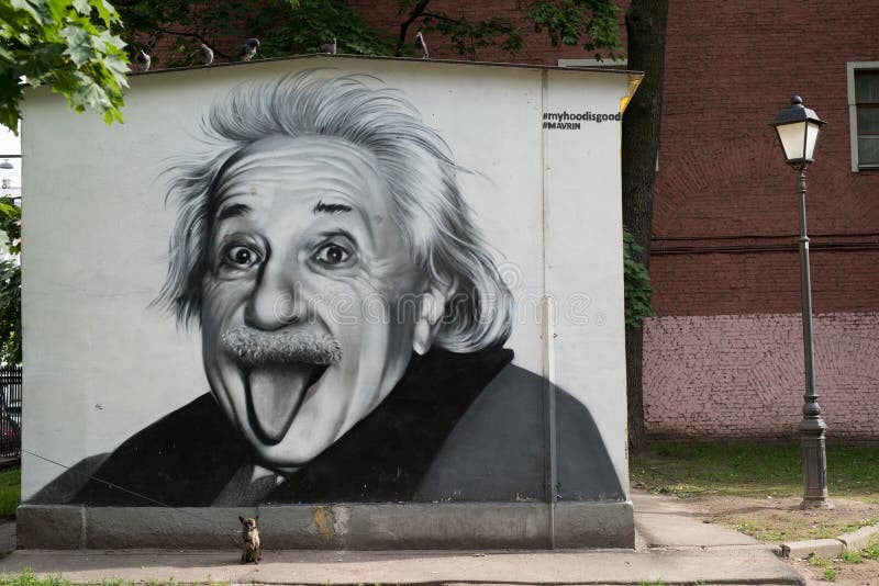 Saint-Petersburg, Russia - June 15, 2016: Graffiti depicting a famous portrait of Albert Einstein on the building in the city center after the image restoration. Saint-Petersburg, Russia - June 15, 2016: Graffiti depicting a famous portrait of Albert Einstein on the building in the city center after the image restoration.