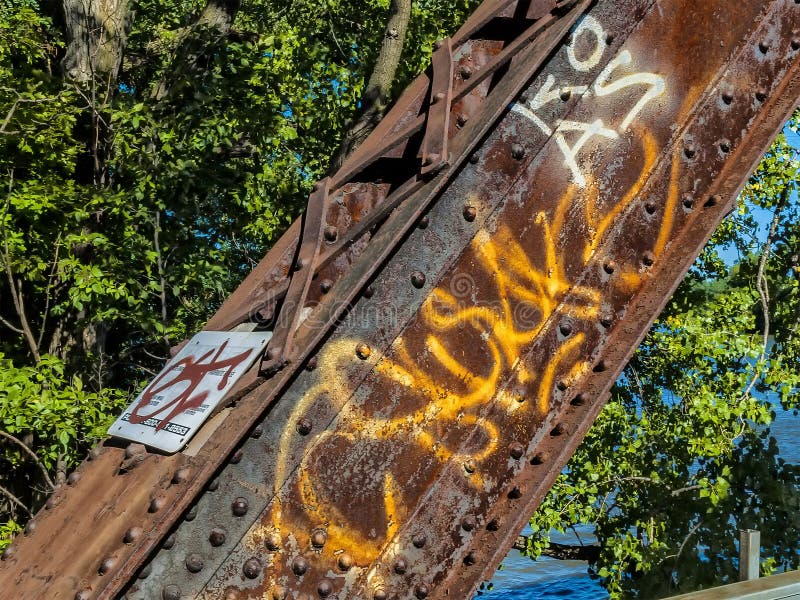 Graffiti on a Rusted Steel Train bridge