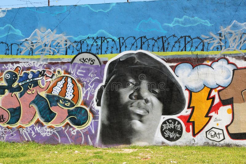 A wall graffiti in lisbon of the rapper Biggie Smalls, who was also known as Notorious B.I.G. he was killed by drive-by shooting. A wall graffiti in lisbon of the rapper Biggie Smalls, who was also known as Notorious B.I.G. he was killed by drive-by shooting.