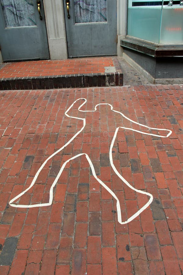 Grafitti of body s outline on brick walkway, downtown Providence,Rhode Island,Summer,2013