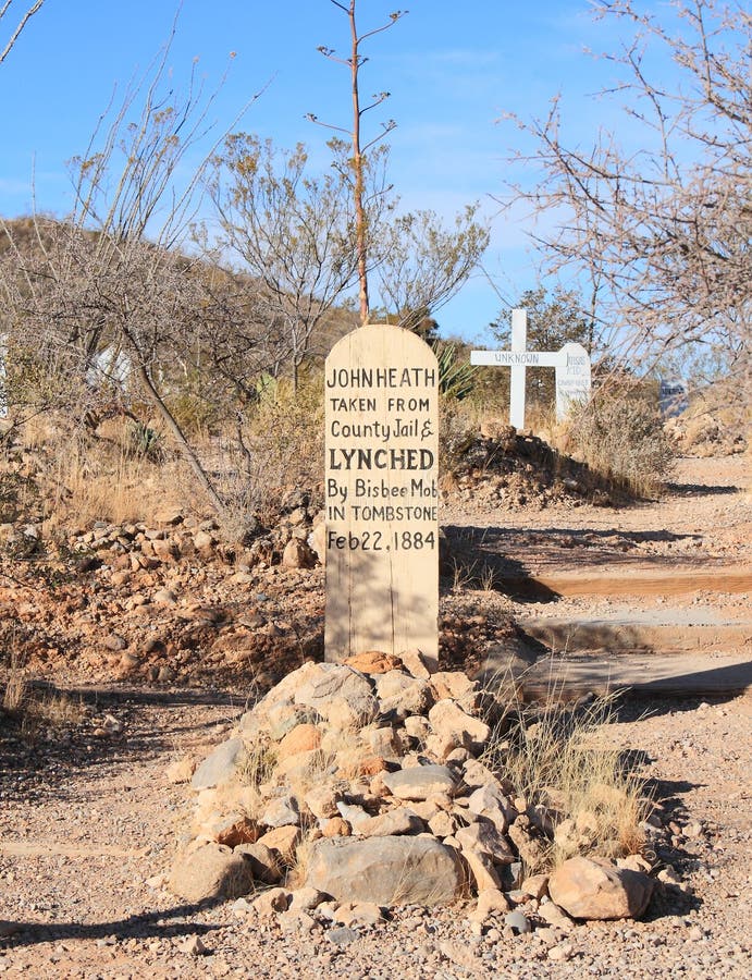 Grafsteen, Arizona: Het Kerkhof van de laarsheuvel - Graf met Houten Grafsteen royalty-vrije stock afbeelding Grafsteen, Arizona: Het Kerkhof van de laarsheuvel - Graf met Houten Grafsteen royalty-vrije stock afbeelding