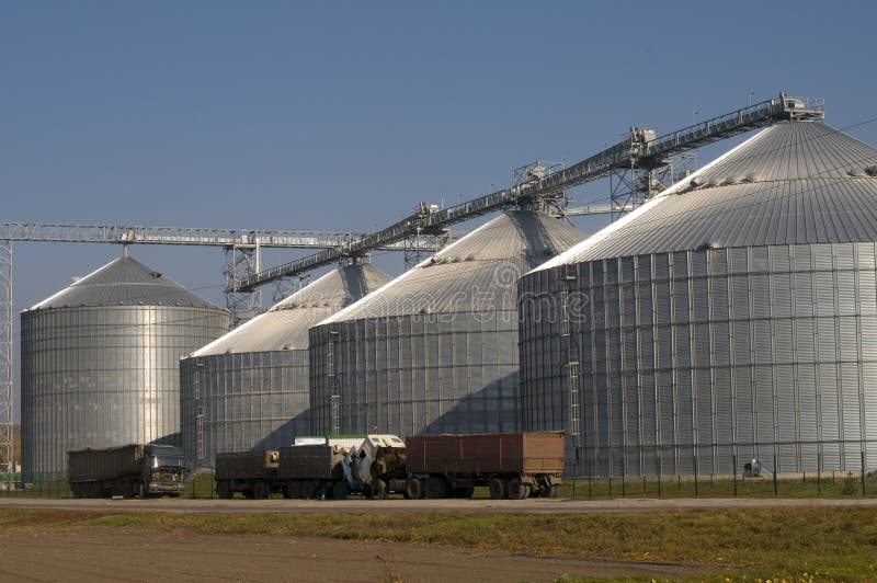Grain elevators stock image. Image of agriculture, business 205970111