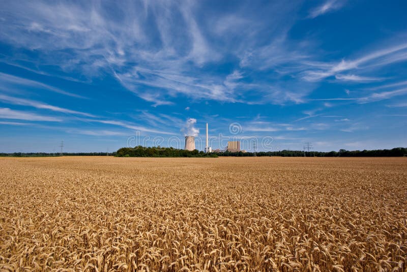 Grainfield and power plant stock image. Image of supply 18867463