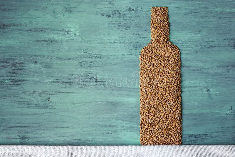 Grains and alcohol bottle stock image. Image of pint 86569907