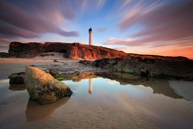 Gran puesta del sol en la Mar-luz de Lossiemouth fotografía de archivo libre de regalías Gran puesta del sol en la Mar-luz de Lossiemouth fotografía de archivo libre de regalías