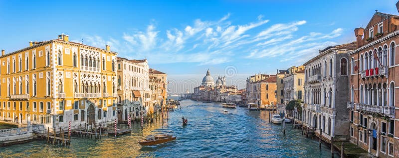 Grand Canal in Venice, Italy. Wide view of the main street panorama of the major street of Venice with motor boats with beautiful stock images Grand Canal in Venice, Italy. Wide view of the main street panorama of the major street of Venice with motor boats with beautiful stock images
