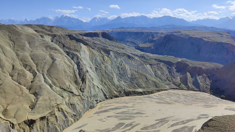 Grand canyon with running river and snow mountains royalty free stock photography