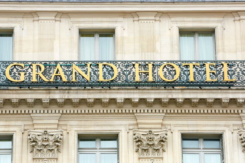 Grand Hotel sign on balcony in Paris, France. Grand Hotel sign on balcony in Paris, France