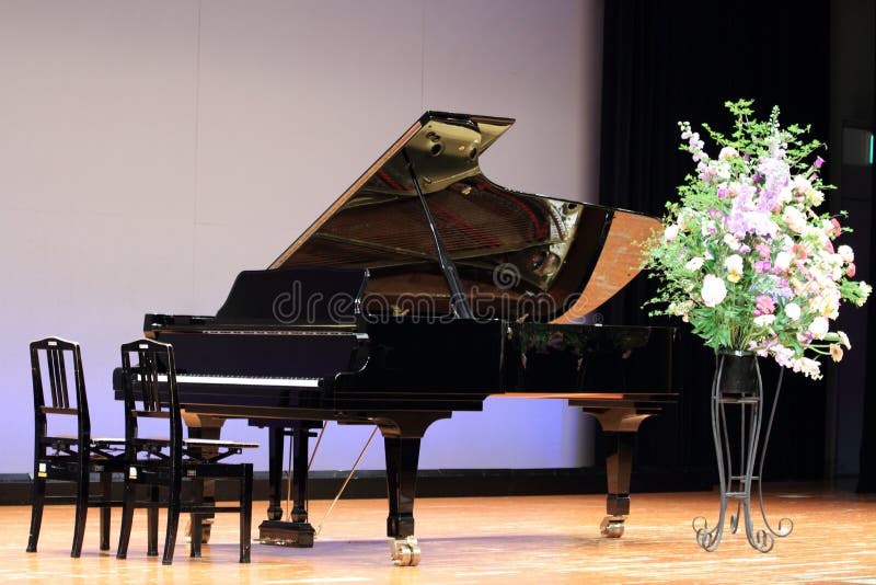 Grand piano on the stage stock photo. Image of musical 83956410