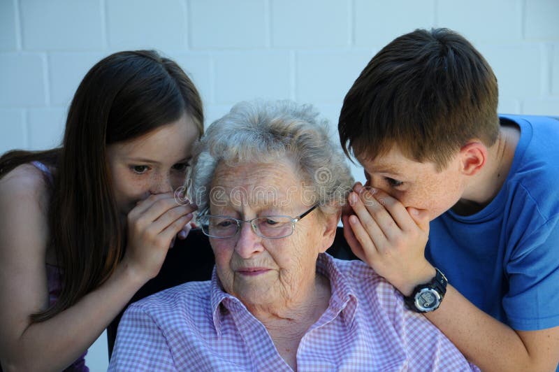 Grandchildren and grandmother stock photo Grandchildren and grandmother stock photo