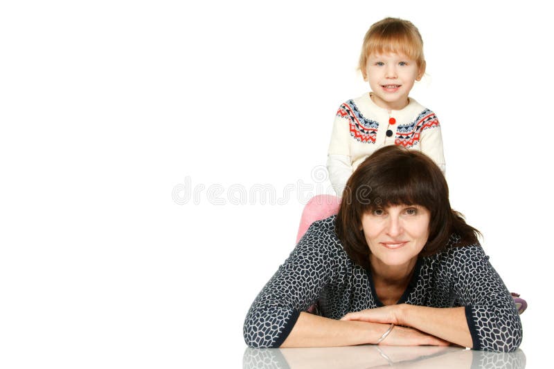 Granddaughter sitting on the back of grandmother