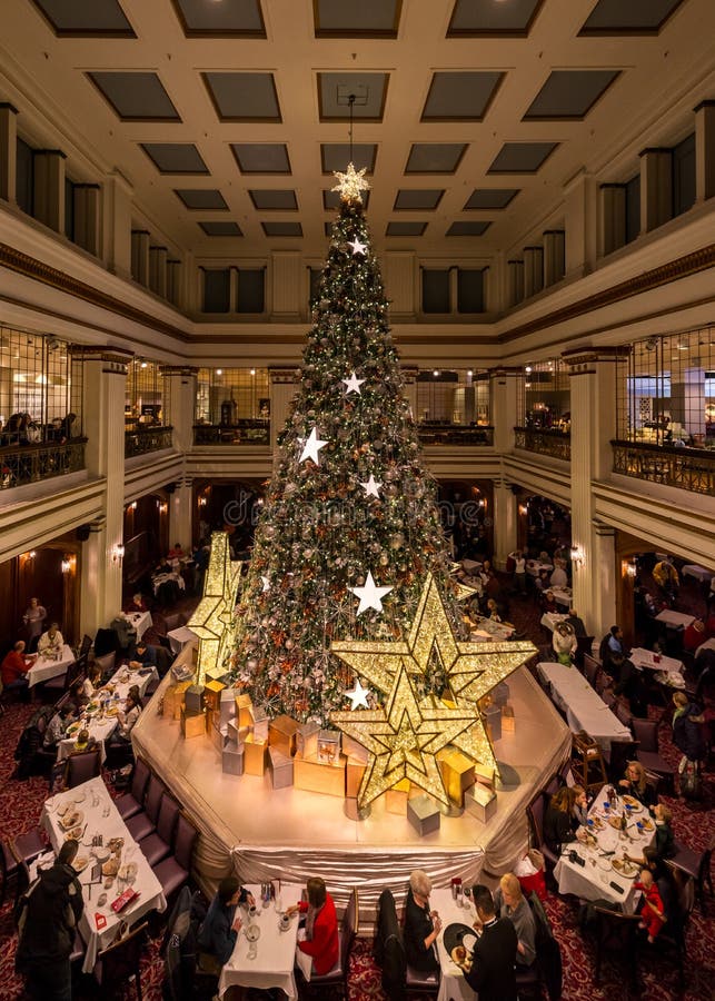 The Great Tree in the Walnut Room of Macy's at State Street, or the Marshall Field & Company Building, on State Street in Chicago, Illinois. The Great Tree in the Walnut Room of Macy's at State Street, or the Marshall Field & Company Building, on State Street in Chicago, Illinois