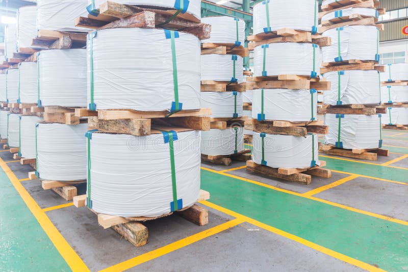 The interior of a steel mill coil warehouse. The interior of a steel mill coil warehouse