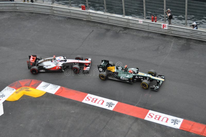 Grande Prix Monaco 2012 - McLaren e Caterham fotografia stock Grande Prix Monaco 2012 - McLaren e Caterham fotografia stock