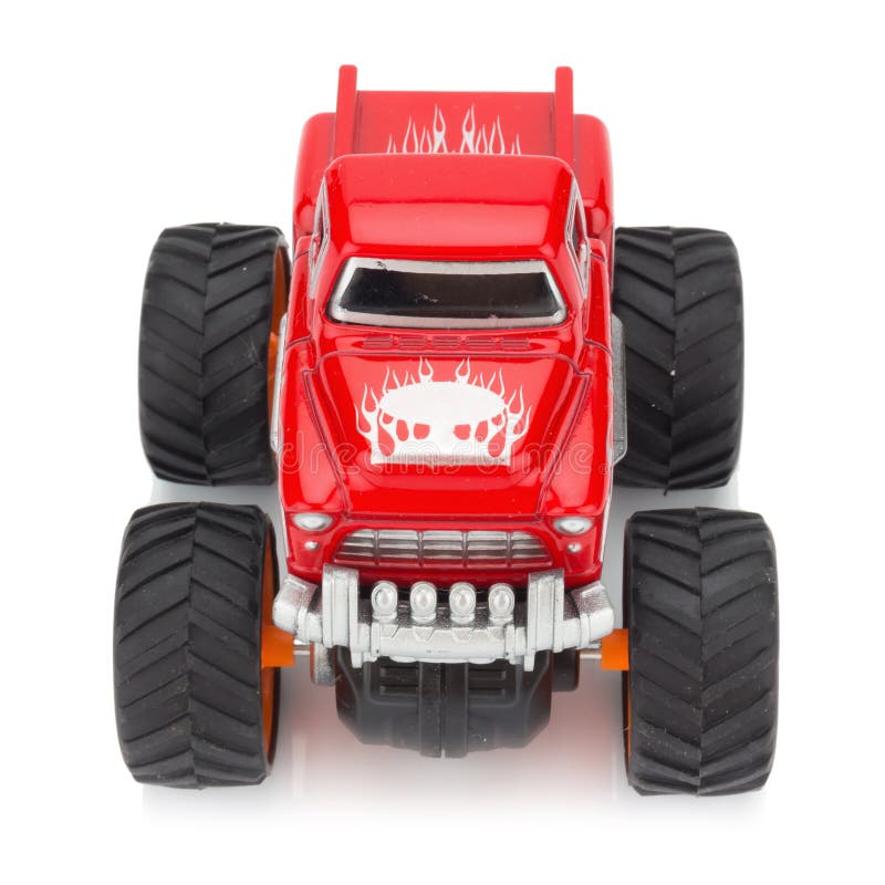 grande rosso di colore del giocattolo del camion isolato su fondo bianco fotografie stock libere da diritti grande rosso di colore del giocattolo del camion isolato su fondo bianco fotografie stock libere da diritti