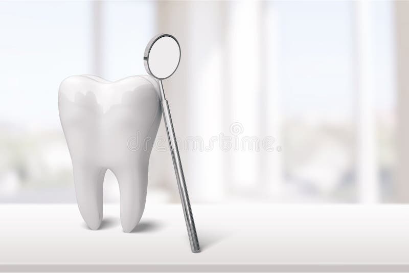 Grande specchio del dentista e del dente nella clinica del dentista sopra fotografia stock Grande specchio del dentista e del dente nella clinica del dentista sopra fotografia stock
