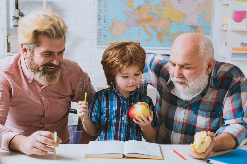 Grandfather Father And Son Learning To Write And Read Grandpa Teaching