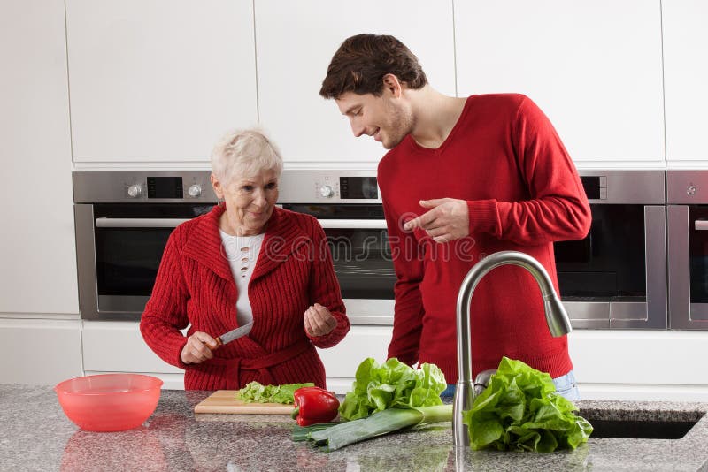 Grandma and grandson cooking royalty free stock photos