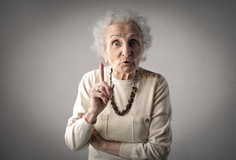 Portrait of a grandmother giving some advice. Old granny stock images, royalty-free photos and pictures