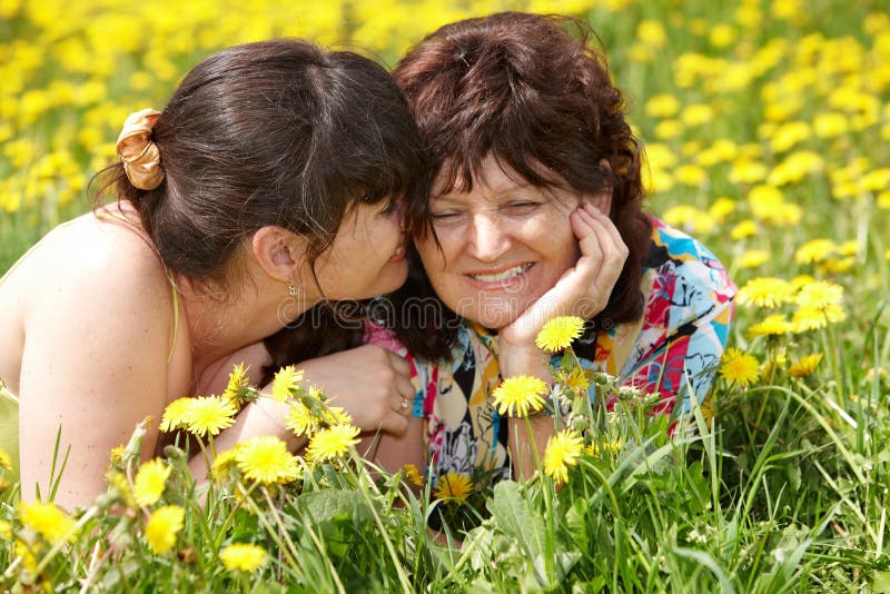 Grandmother with daughter in outdoor. stock image Grandmother with daughter in outdoor. stock image