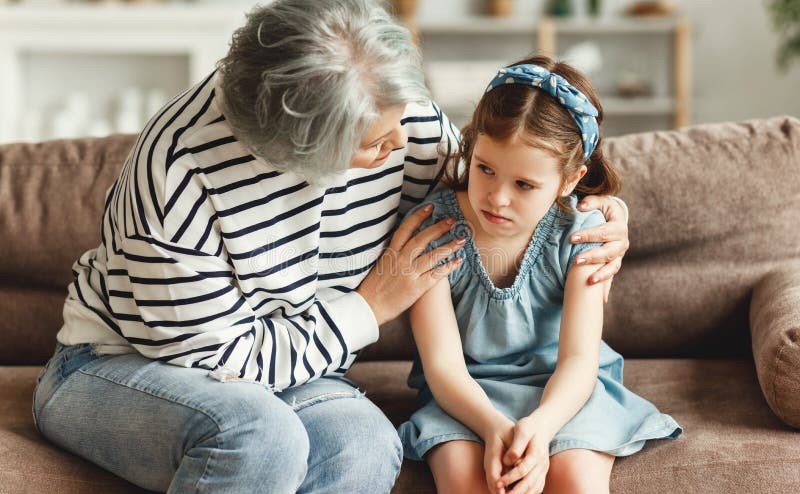 Grandmother supporting resentful granddaughter at home
