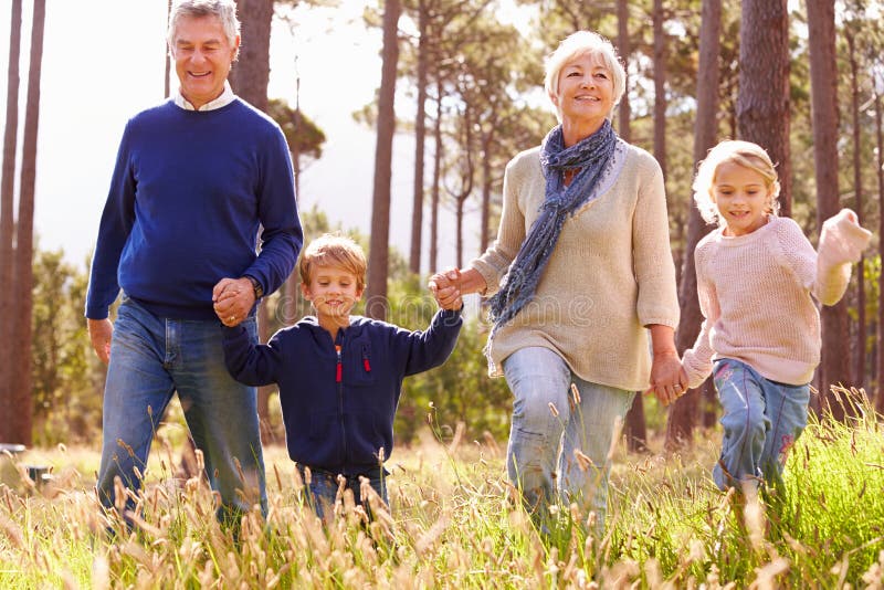 Grandparents and grandchildren walking in the countryside stock photos Grandparents and grandchildren walking in the countryside stock photos