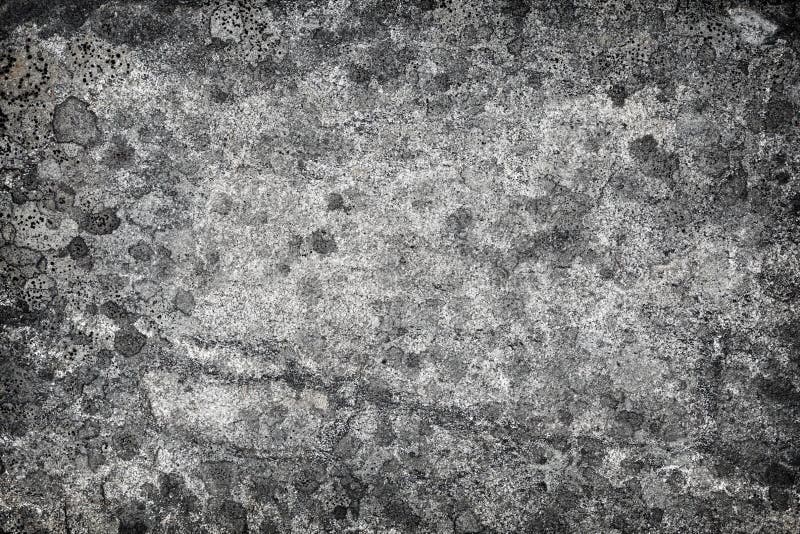 Granit avec des souillures de lichen - fond en pierre