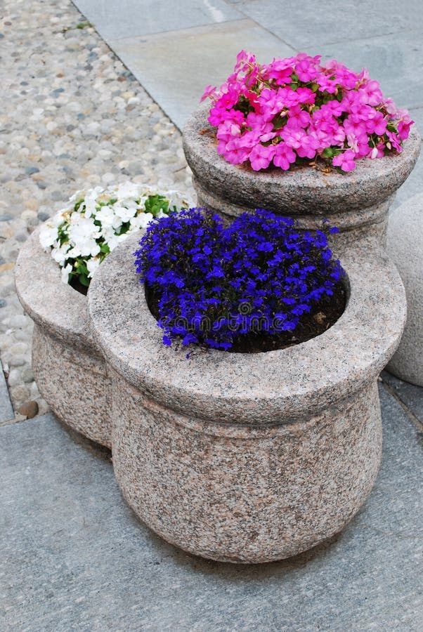 Granite flower pot stock photo. Image of flowerpot, road 22945072