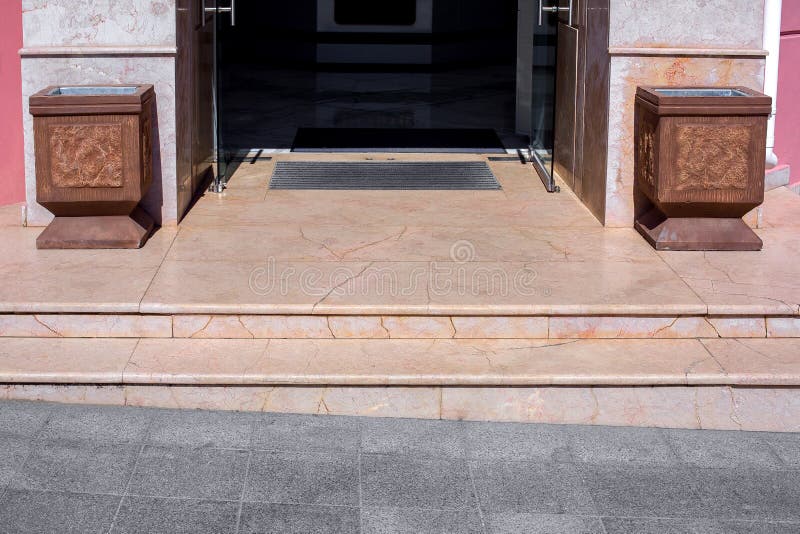 Granite threshold with steps at the entrance. stock photos