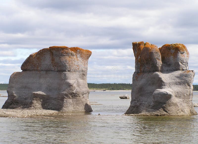 Granitic islets and reefs. Details of granitic islets and reefs of Archipelago Mingan in the St. Lawrence River, Quebec, Canada stock photography Granitic islets and reefs. Details of granitic islets and reefs of Archipelago Mingan in the St. Lawrence River, Quebec, Canada stock photography