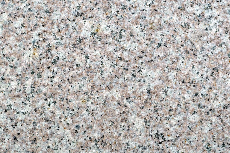 A crafted flat surface shows texture of granite. A crafted flat surface shows texture of granite.