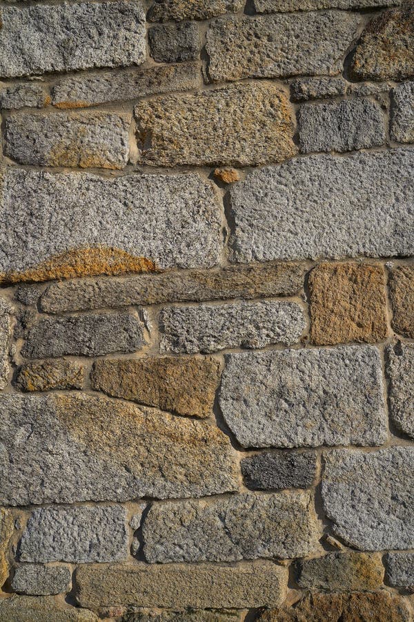 Granite stone bush hammered masonry wall in Galicia Spain. Granite stone bush hammered masonry wall in Galicia Spain