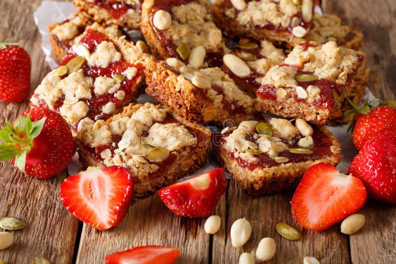 Granola Bars with Strawberry Jam, Seeds and Nuts Closeup. Horizontal