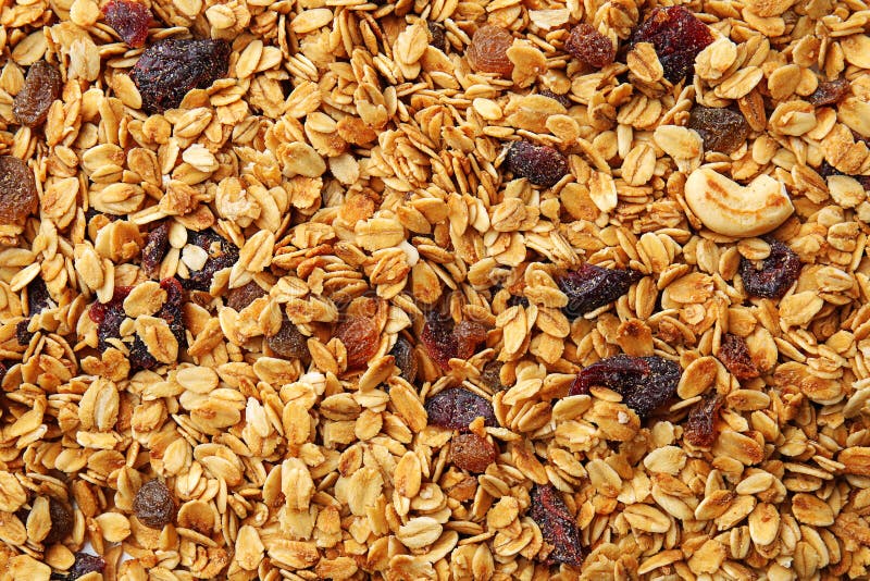Granola with Raisins and Almonds in Bowls on Grey Background Stock