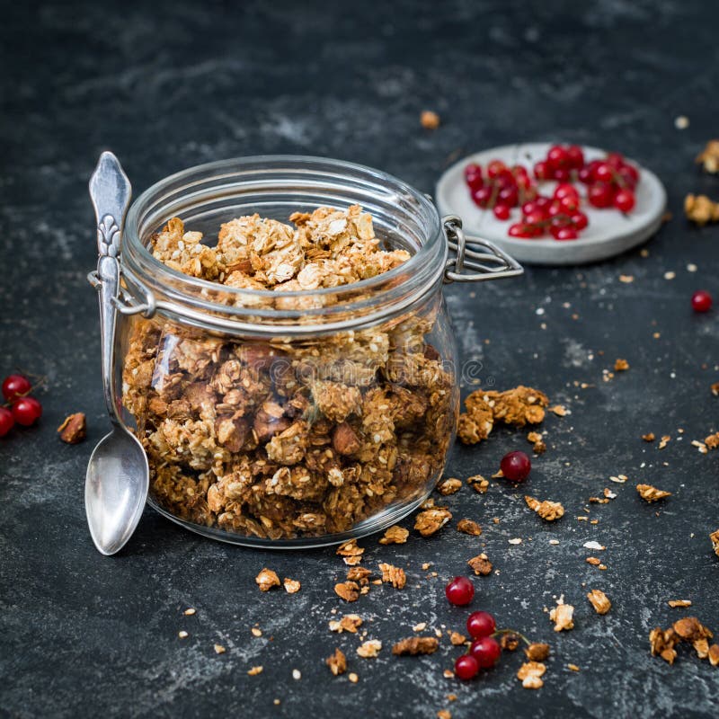 Granola in jar stock image. Image of dessert, background 98721591