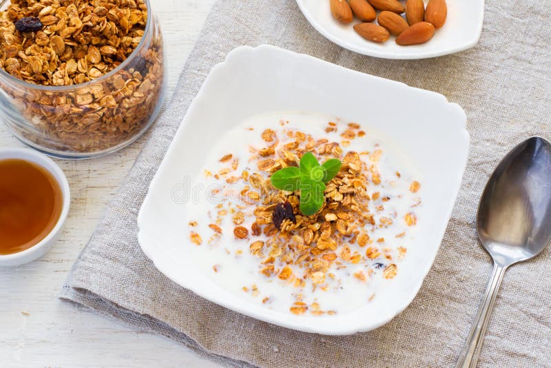 Granola with Milk, Honey and Nuts. Healthy Breakfast. Stock Image