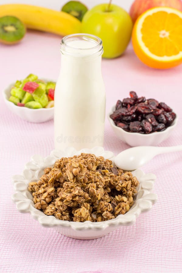 Healthy Granola Muesli Cereals with Chocolate Background Stock Photo