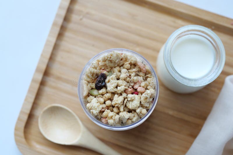 Granola Musli and Glass of Milk on Table Stock Image Image of flakes
