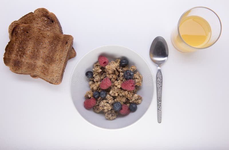 Granola with Orange Juice and Two Slices of Toast Stock Image Image