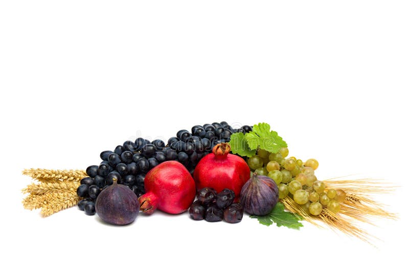Grapes, Dates, Figs, Barley And Wheat On A White Background