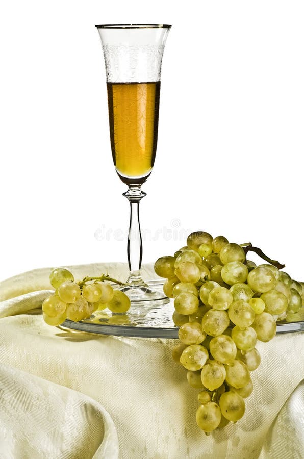 Grapes and a glass of wine stock photo. Image of drink 28724652