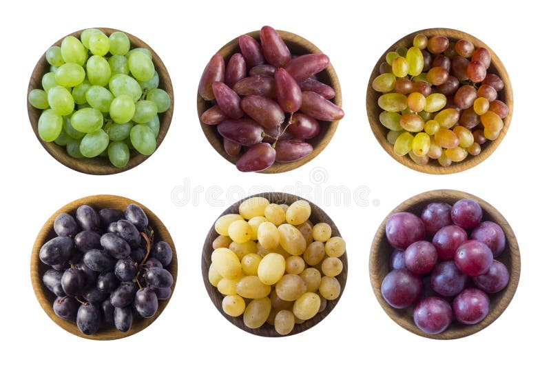 Grapes in a wooden bowl isolated on white background. Yellow, blue, pink and green grapes on white background. stock photo Grapes in a wooden bowl isolated on white background. Yellow, blue, pink and green grapes on white background. stock photo