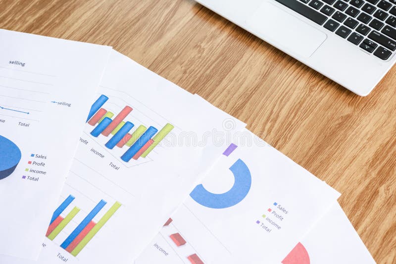 Graph on the Desk Analysis and Laptop with Business Stock Image Image
