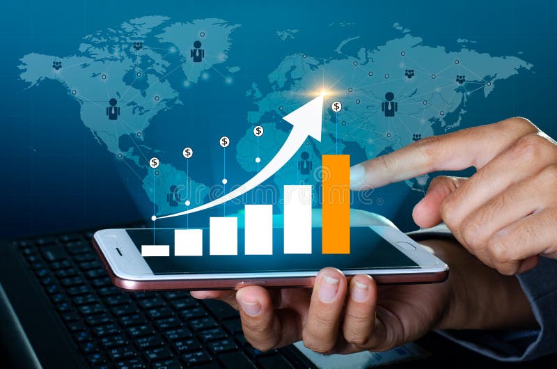 Graph of financial growth global communications Binary Smart Phones and world Internet Business people press the phone to communicate in the Internet Stock chart Researching process.business Team Working Startup modern office Laptop global strategy virtual Icon.Innovation graphs Interfaces