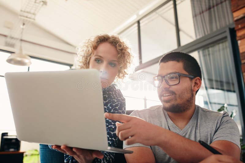 Graphic designer using digital graphics tablet and desktop stock photo Graphic designer using digital graphics tablet and desktop stock photo