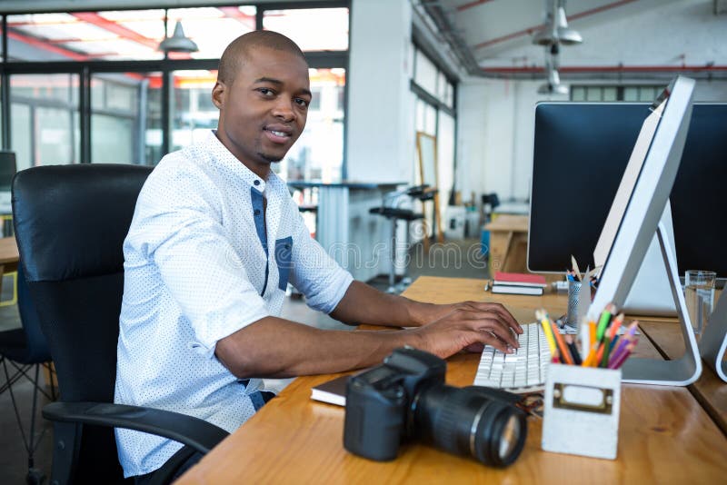 Graphic designer working at desk stock images Graphic designer working at desk stock images