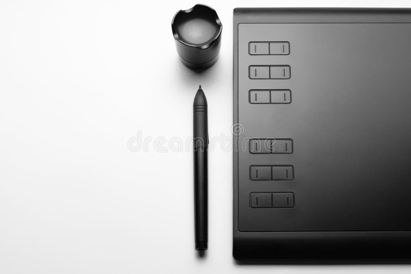 Graphic Tablet with Pen for Illustrators and Designers on White Background. Copy Space Stock