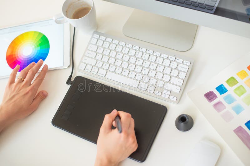 Graphic web designer does the work using a graphics tablet, desktop stock image Graphic web designer does the work using a graphics tablet, desktop stock image