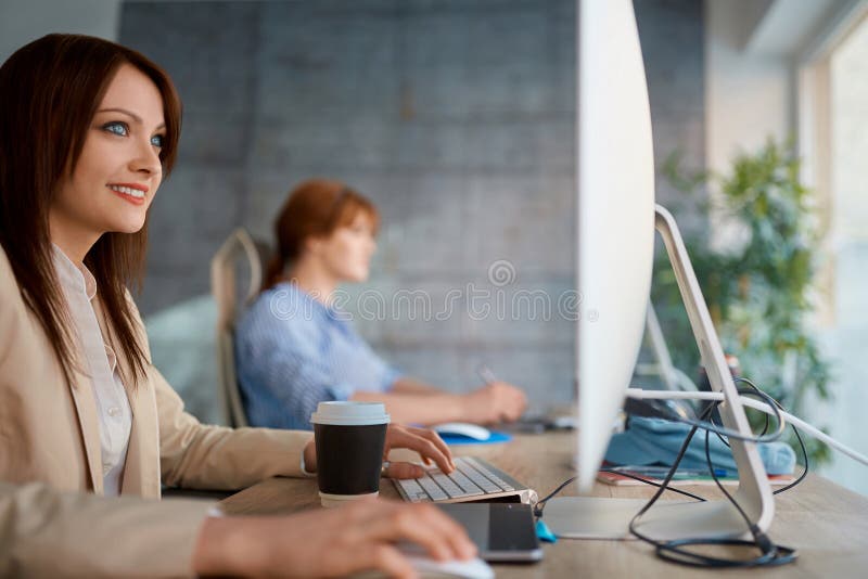 Graphic woman designer at work working on computer for new project. stock photo Graphic woman designer at work working on computer for new project. stock photo